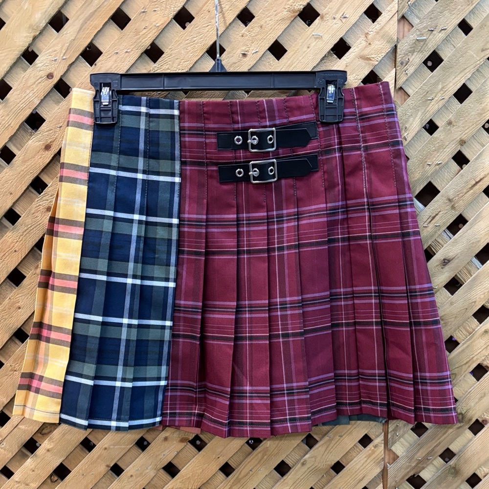 No Boundaries Juniors Plaid Pleated Mini Skirt in Red, Yellow, and Blue